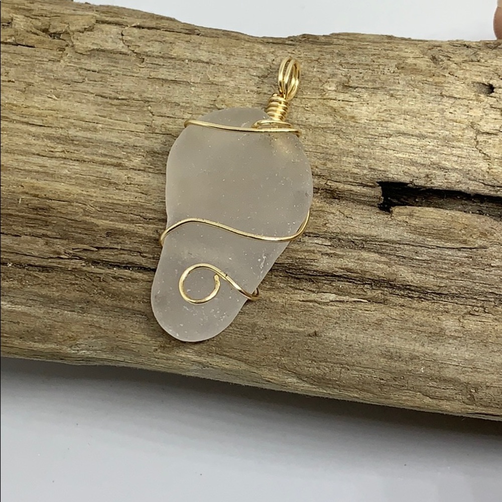 White Sea glass and gold colored wire pendant